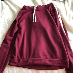 Red hoodie with white stripes down sides